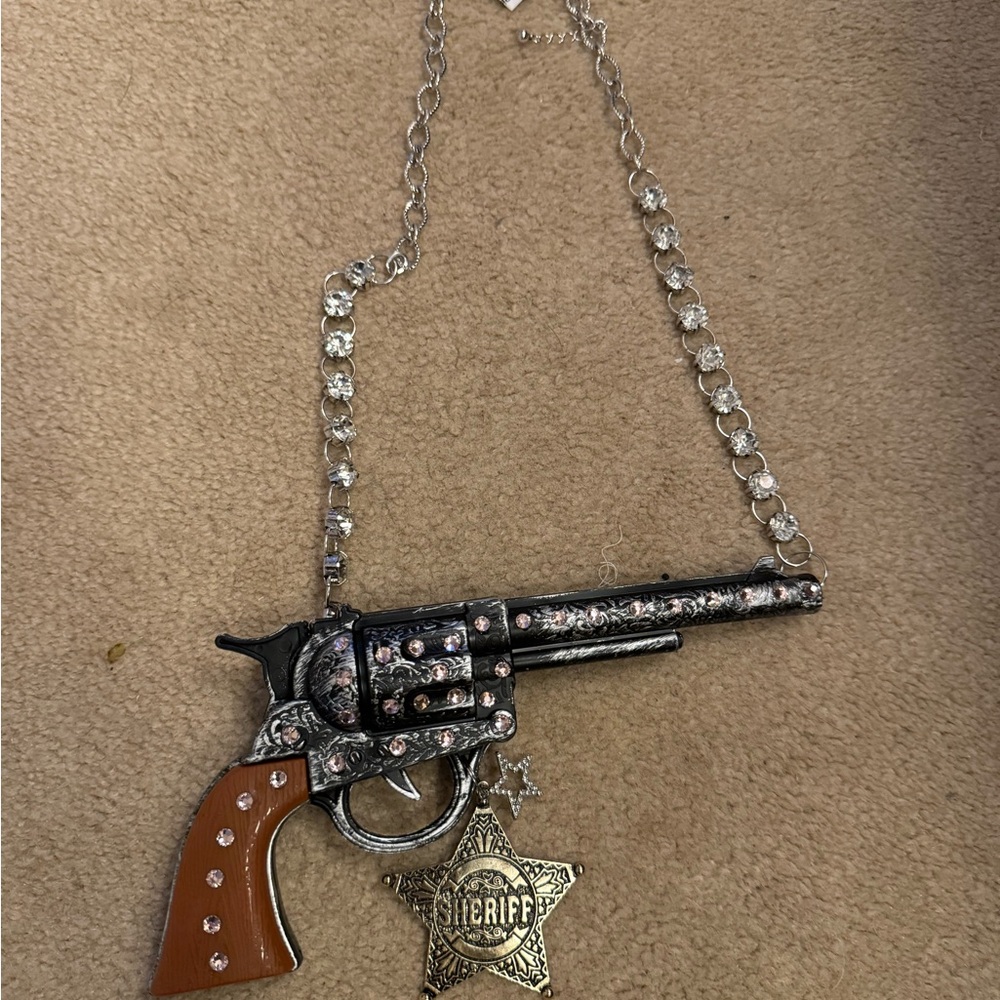 Silver and Brown Toy Gun Necklace with Sheriff Badge